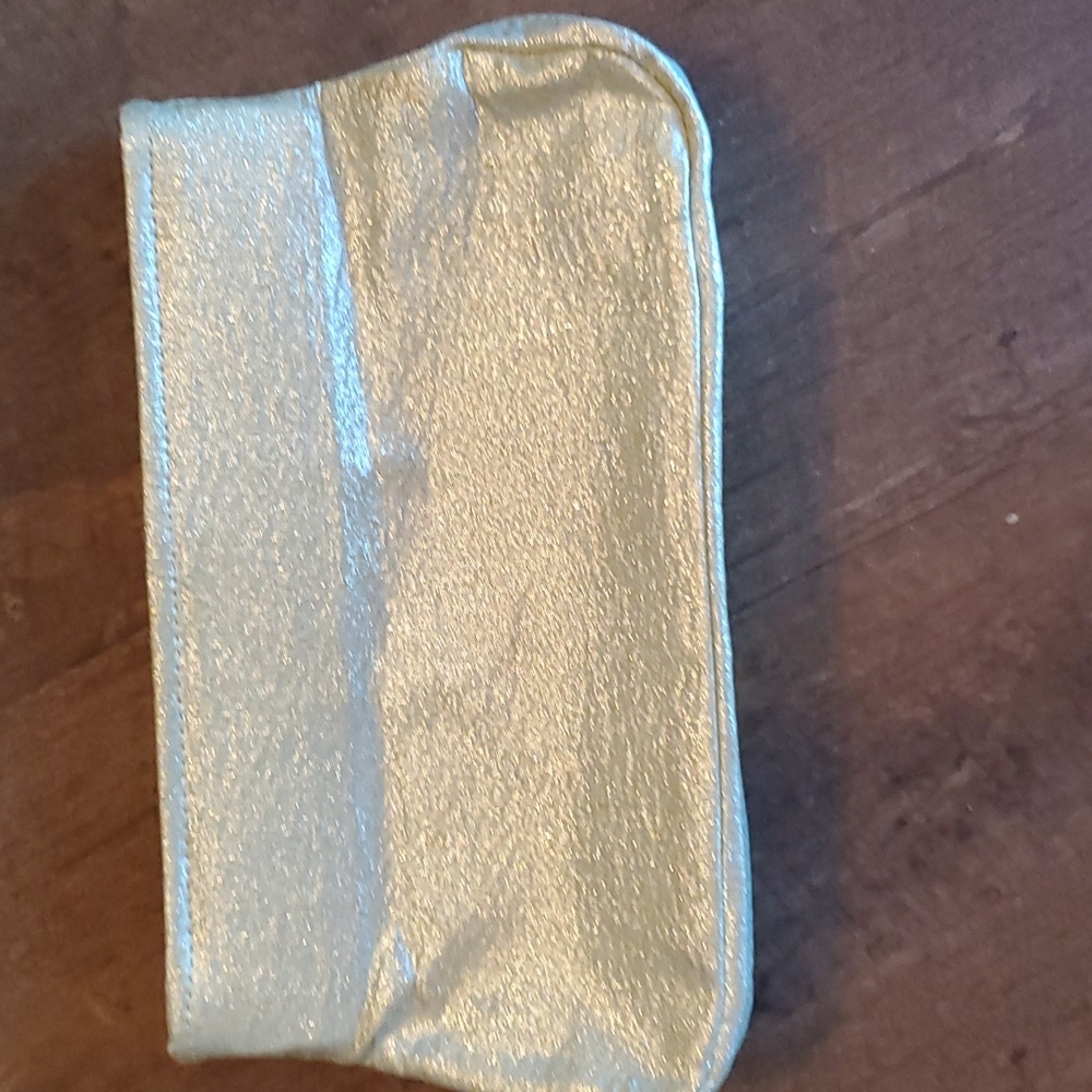 Shiny clutch with strap